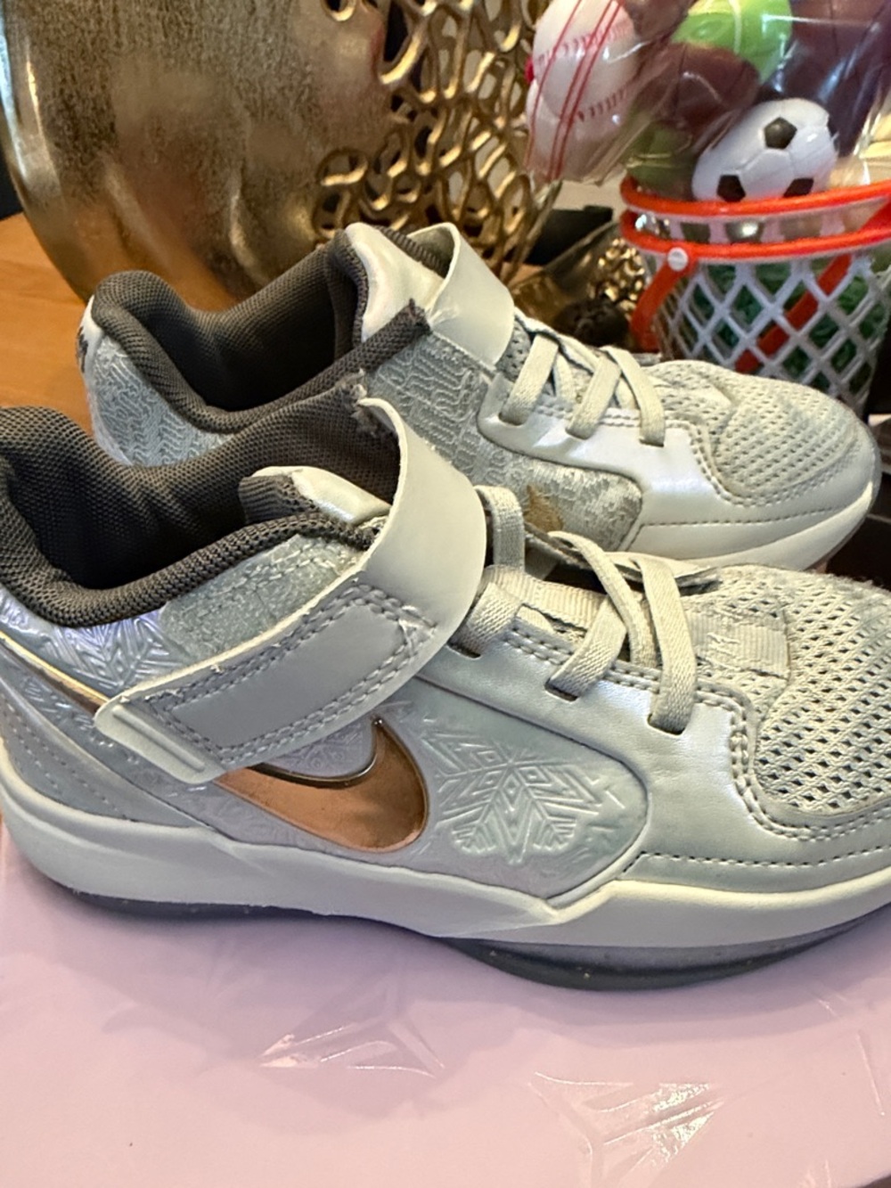 Nike Kids Silver Sneakers with Metallic Rose Gold Swoosh